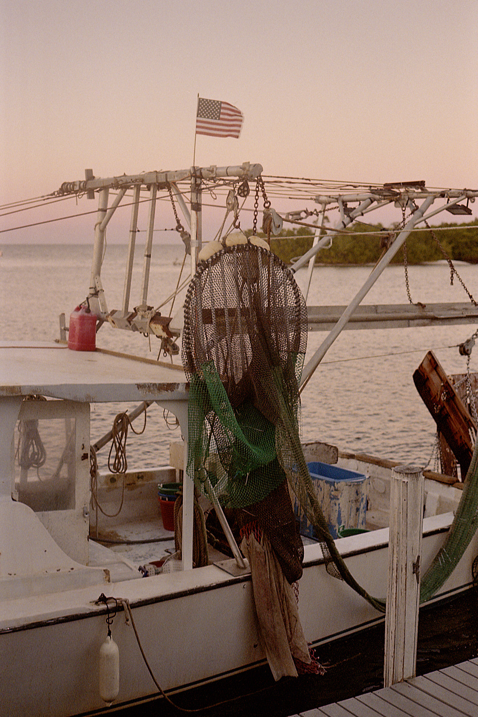Documenting a small, local, fishing community in Southern Florida. Jug Creek is an old school commercial fishing dock and marina located near Ft. Myers, these photos share the stories of the locals who make their livelihood here.