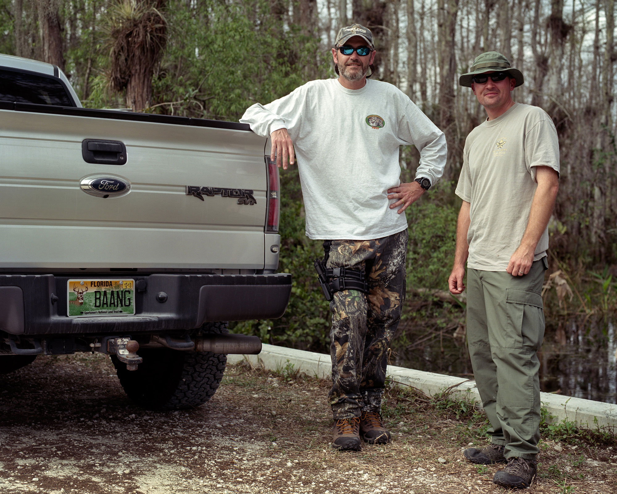 Hunting invasive Burmese python in Southern Florida Everglades. Documentary photos shot on Kodak film